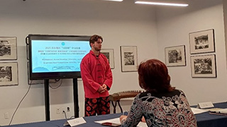 Liam Knotek presenting at the "Chinese Bridge" Competition.