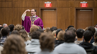 Fr. Nick Sertich describing the ashes 