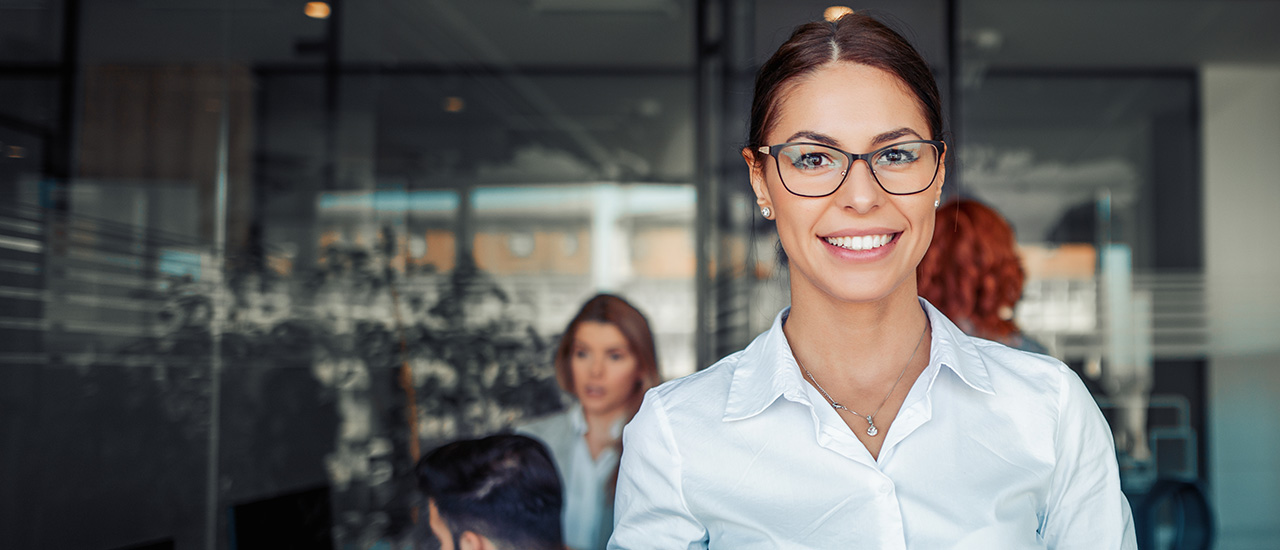 Woman in a workplace setting.