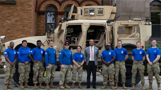 Pirate Battalion members in front of an Army- M-ATV