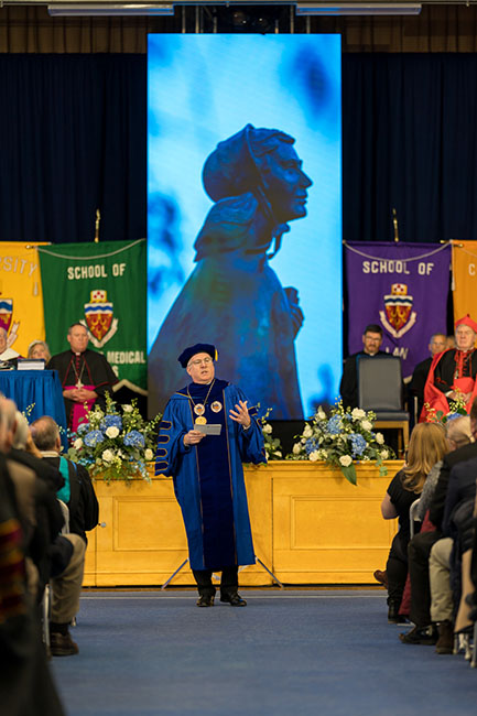 three students at a tablet