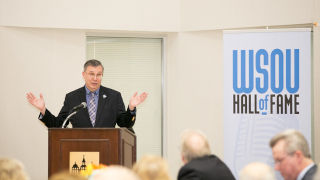 Alumni Bernie Wagenblast speaking at a conference