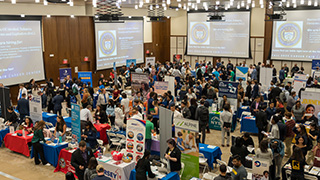 Image of students attending a career fair on campus in 2023.