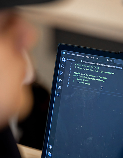A computer screen displaying lines of code.