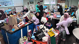 Toy Drive Volunteers and Toys Collected