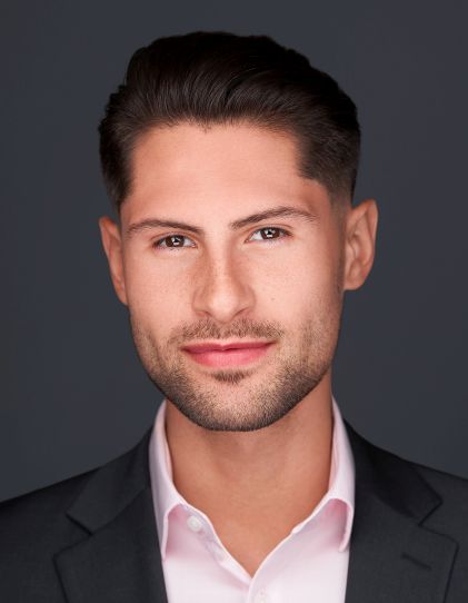 A headshot of SHU alum Liam Cassidy