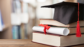 books with graduation cap