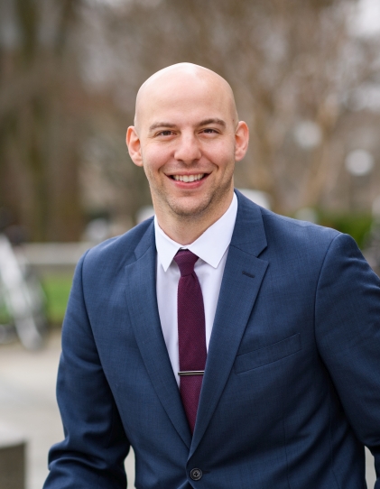 A headshot of SHU alum Jonathan Stoessel