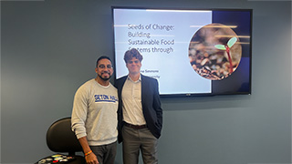 professor with student at presentation at yale university 