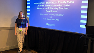 Kristi Stinson presenting interdisciplinary research at Transform 2025