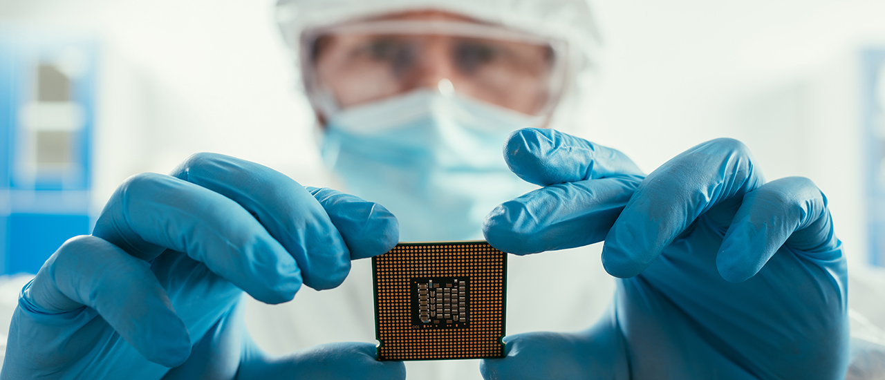 Lab technician with chip 