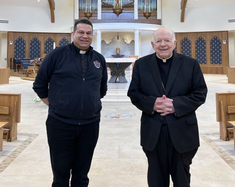 A photo of Bishop Flesey and Father John Job
