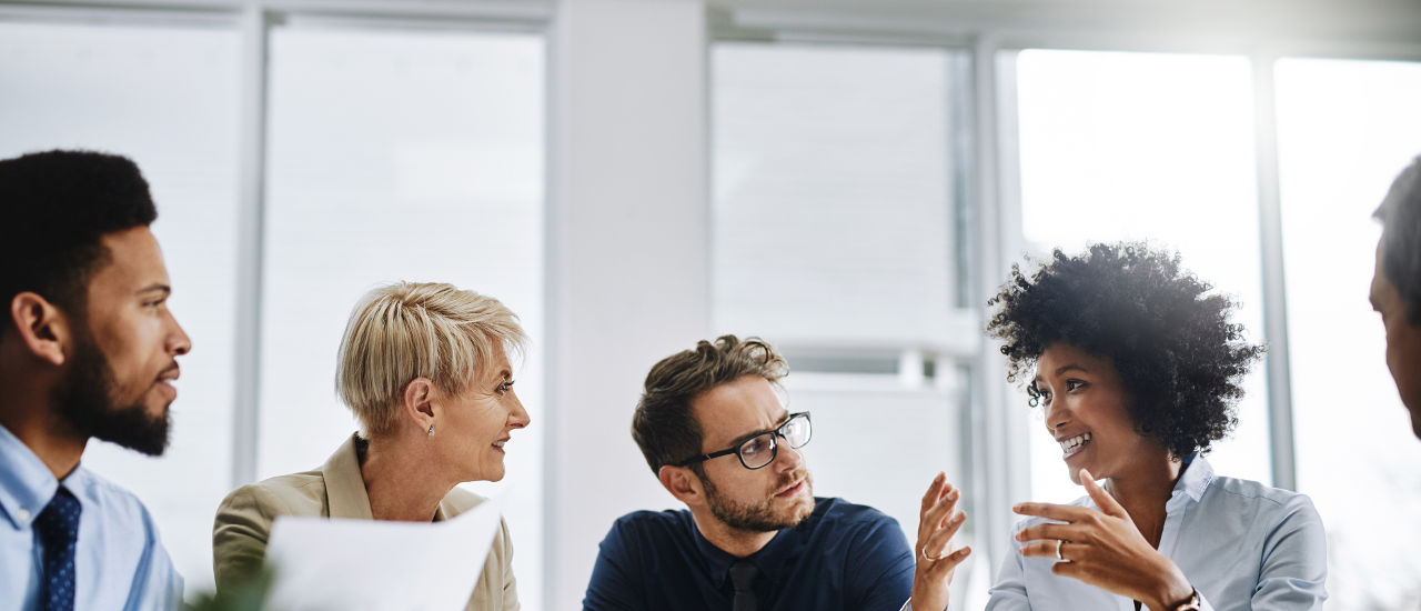 People discussing ideas in a meeting. 