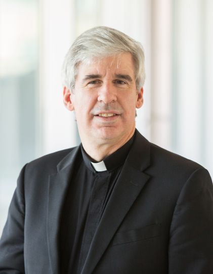 A headshot of SHU monsignor Gerard McCaren