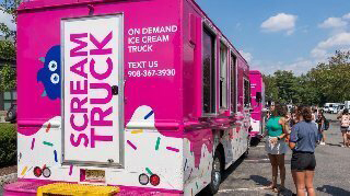 Students getting ice cream at The Scream Truck 