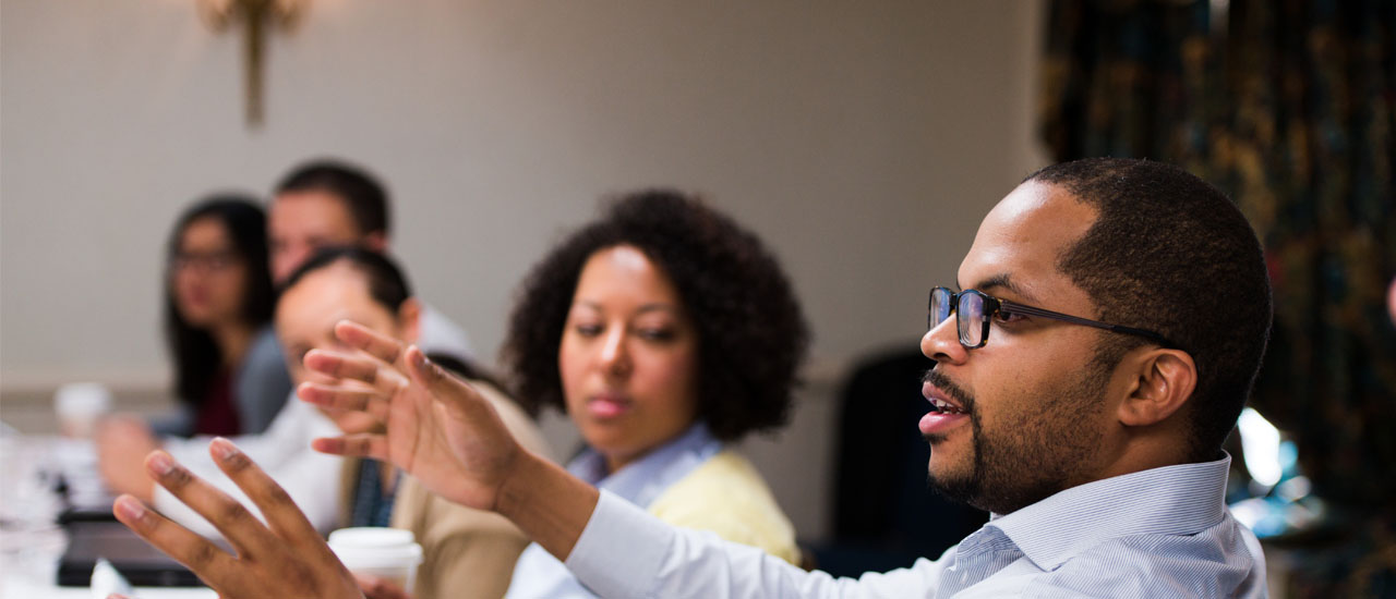 A discussion taking place in a classroom. 