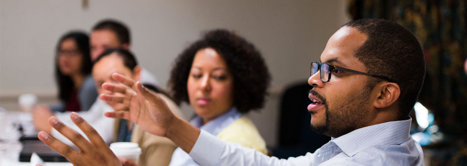 Students talking in class. 