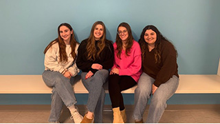 Second-year students in Seton Hall’s M.S. in S.L.P. program assist with a weekly play group. From L-R: Kaylen Christiansen, Ashley Bernhammer, Nicole Ribeiro and Angela Acosta.