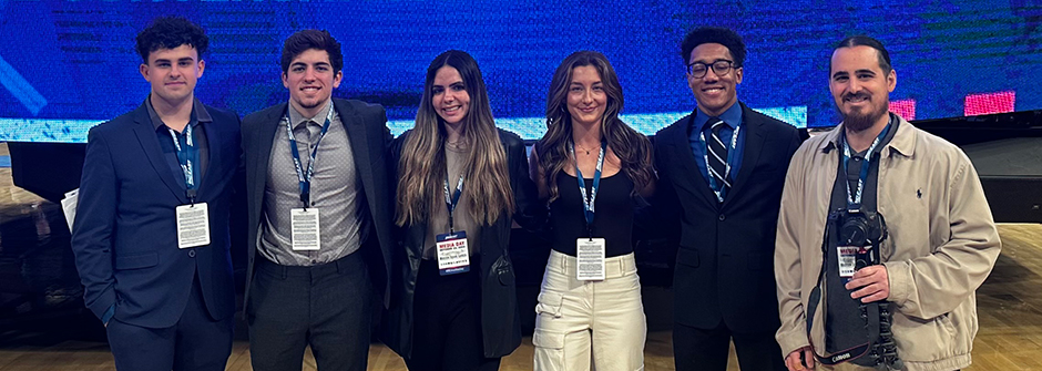 Center for Sports Media students posing at the Big East Conference Media Day. 