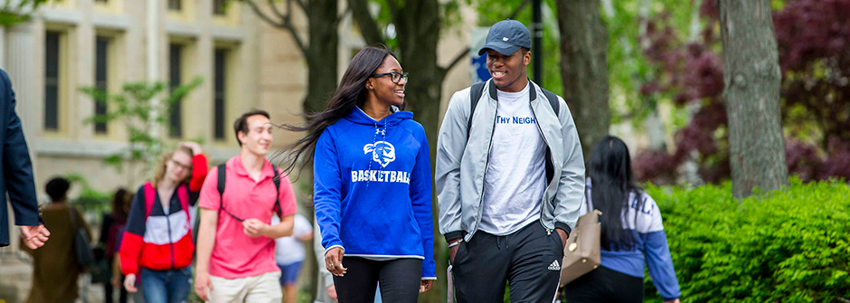 A photo of students walking across campus.