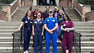 Rajai (front right) and fellow PA students